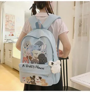 Light blue cute canvas school backpack with cartoon animal graffiti and large capacity for students.