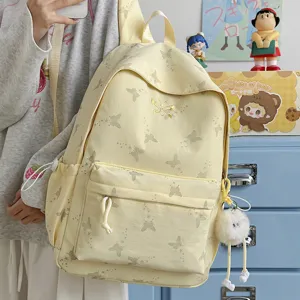 Cute yellow butterfly pattern school backpack for girls casual daily student bag.