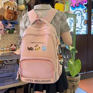 Pink cute student backpack with cat embroidery and large capacity for casual travel and daily school.