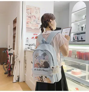 Cute cartoon graffiti canvas backpack for students, large capacity casual daily school bag.