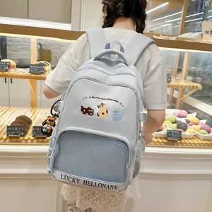 Cute blue student backpack with cat embroidery and large capacity for school travel daily use