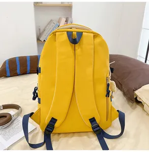 Casual solid color minimalist backpack, stylish travel daypack for daily use, lightweight school bag.