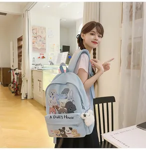 Light blue cute cartoon canvas backpack for students, large capacity casual daypack daily use.