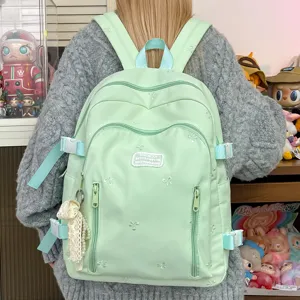 Cute bow embroidered school backpack for women, large capacity casual student bookbag.