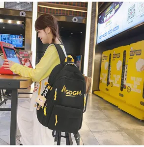 Casual black backpack with yellow straps and letter print for daily use, school and travel.