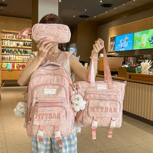 Pink quilted school backpack set for girls, large capacity three-piece student bag.