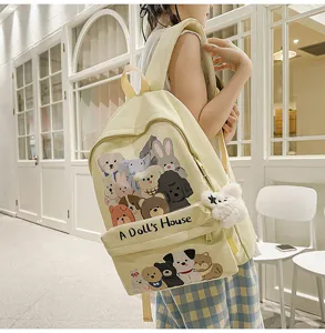 Cute aesthetic yellow canvas student backpack, large capacity school bag with cute dog prints.