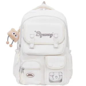 Korean style white canvas backpack with multi pockets, cute plush pendant, large capacity school bag.