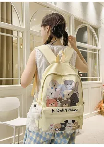 Cute canvas backpack with cartoon animal graphics and front pocket text for daily school use.