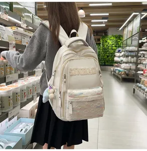 Casual large capacity backpack for students, stylish white school bag with zipper pocket.