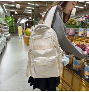 Casual white large capacity school backpack for students, stylish lightweight for daily use.