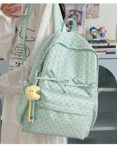 Japanese ins style cute polka dot backpack for women, aesthetic school bag with bow.