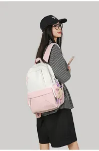 Casual large capacity canvas backpack for women, stylish minimalist school bag for use.