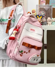 Mochila escolar casual rosa y blanca para estudiantes, gran mochila de viaje para uso diario.