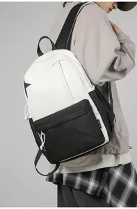 Stylish black and white casual backpack for women, large capacity minimalist school bag.