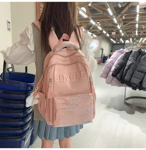 Pink student backpack detail view, large capacity casual daypack with front pocket design.