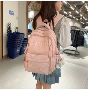 Stylish pink large capacity backpack for students, lightweight and practical daily school bag.