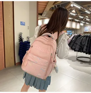 Stylish pink school backpack for students, large capacity lightweight casual daypack bag for teen.