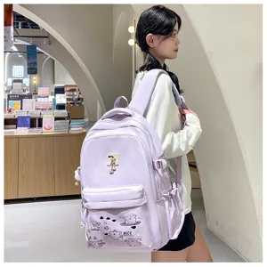Detail view of a light purple casual backpack with bear prints and front pocket for daily use.