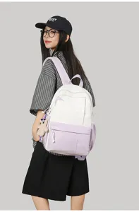 Large capacity casual contrast color backpack with cute bear pendant for daily travel school.