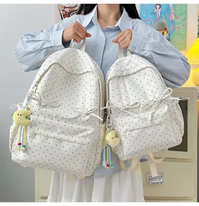 Cute Japanese style polka dot backpack set for students, casual white school bag with bows.