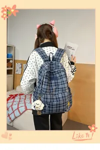 Detailed view of the vintage plaid backpack with multi-compartment design for daily use.