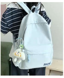 Lightweight casual school backpack for women and students, simple daily daypack in light blue.