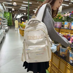 Stylish minimalist large capacity white school backpack for students, casual daypack.
