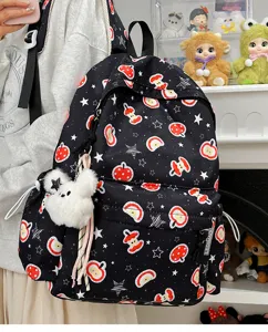 Cute Korean style black apple print backpack with fluffy plush bear pendant for daily use.