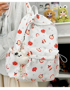Cute Korean style white backpack with red apple print and fluffy pendant for student girls.