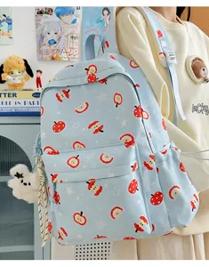 Cute cartoon apple print backpack for women, stylish Harajuku style school bag for daily use.