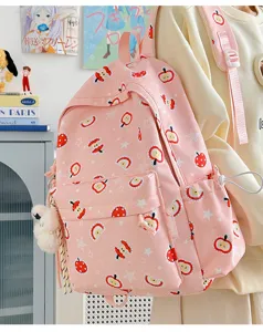 Cute pink canvas backpack with cute apple print, casual school bag for daily use and travel.
