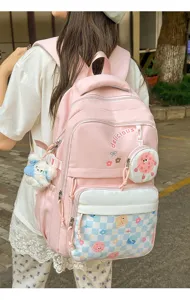 Casual Japanese style pink backpack for students and daily commuting, large capacity view.