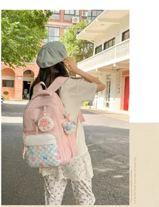 Japanese style casual large capacity pink school backpack for daily commute and outdoor travel.