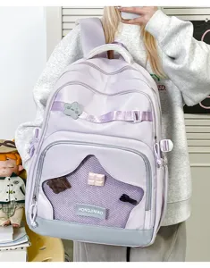 Zaino scolare viola chiaro carino con grande capacità, tasca in rete e ciondoli adorabili.