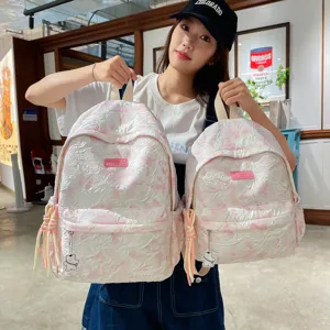 Stylish pink and white casual backpack for women, large capacity stylish school bag for daily use.