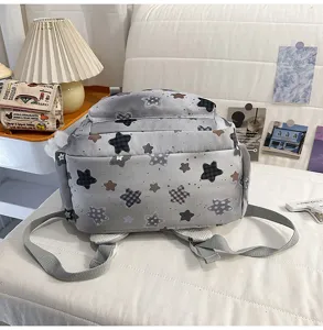 Lightweight casual grey star printed school backpack for students, stylish daily daypack for teens.