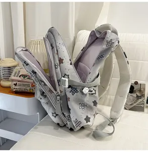 Casual star printed student backpack, lightweight grey school bag for teenagers daily use.
