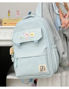 Cute light blue student backpack with large capacity, multiple pockets and sweet cookie prints.