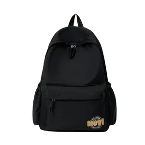 Casual black backpack for women and students, simple stylish daily school bookbag and travel daypack.