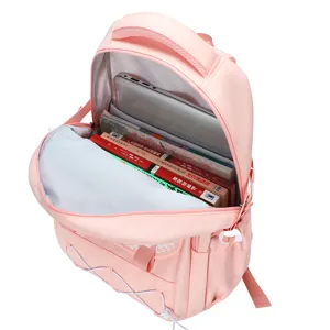Zaino scolastico rosa di grande capacità con scomparti multipli per libri e laptop.