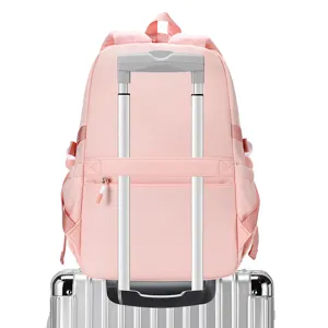 Zaino scolastico rosa con cinghia per valigia, zainetto casual per studenti e viaggi quotidiani.