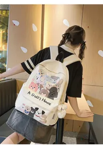 Cute cartoon graffiti canvas backpack with large capacity, perfect for students daily commute.