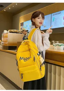 Detail shot of stylish yellow casual backpack, large capacity korean style student school bag.