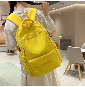 Sac à dos jaune en toile décontracté cartable scolaire grand format léger et pratique