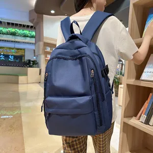 Sac à dos décontracté de style collège pour étudiants, léger, grand sac de grande capacité.
