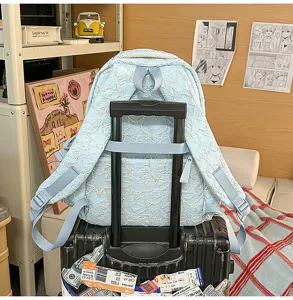 Light blue star quilted commuter backpack large capacity school bag for daily use and travel
