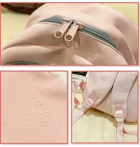 Cute pink backpack detail view featuring waterproof fabric, smooth dual zippers, and comfortable straps.