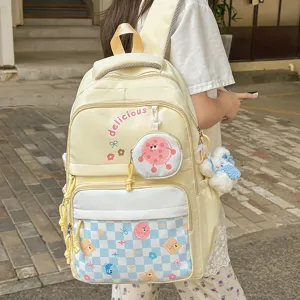 Japanese style casual large capacity light yellow school backpack worn on back outdoor view