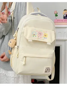 Detailed view of the aesthetic canvas backpack with cute cookie graphic and spacious compartments.